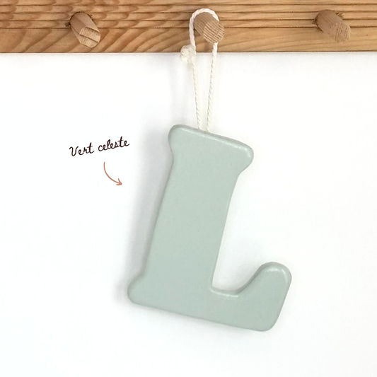 Lettre initiale sur cordon